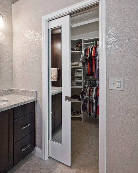 Mirrored pocket doors provide a space-saving alternative for a walk-in closet off the master bath.  #Monday#Masterbath #showerrestoration #tubreglazing Bedroom Wardrobe Ideas Sliding Doors, Exterior Pocket Doors, Pocket Doors Bathroom, Space Saving Closet, Small Closet Storage, Bedroom Closet Doors, Mirror Closet Doors, Closet And Bathroom, Sliding Closet Doors