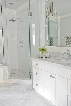 Going for this look. Light grey floor tiles, white vanity, quartz countertop, white stacked wall tiles with accent tiles, and niche. Cabinet - Strasser..Finial Kohler Faucet and showerhead. Oval undermount sink, American STandard Optum VorMax toilet, solid surface shower pan. Bathrooms Makeover, Ensuite Design, Marble Tile Bathroom, Redecorating Ideas, Bilik Air, Planting Tips, Big Personality, Suburban House, Hallway Bathroom