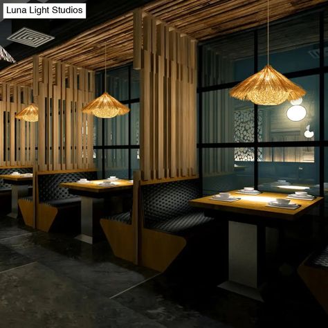 This minimalist cone suspension light is crafted from rattan in a warm wood finish. The single light pendant hangs from a round canopy and is perfect for use in a restaurant or any other space in need of chic and stylish ceiling lighting. The light requires one E26/E27 bulb (not included) and has a voltage of 220V-240V or 110V-120V.Size: 15 to 19 Inch Fixture Width: 19.5" Fixture Height: 10" Bulb Included: No Number of Lights: 1 Color: Wood Style: Oriental Material: Rattan Fixture Type: With Shade Feature: Hanging Voltage: 220V-240V 110V-120V Bulb Base: E26/E27 Light Type: LED/Incandescent/Fluorescent Restaurant Lighting, Restaurant Concept, Coffee Shop Design, Single Pendant Lighting, Hanging Fixture, Suspension Light, Pendant Ceiling Light, Home Ceiling, Modern Ceiling Light