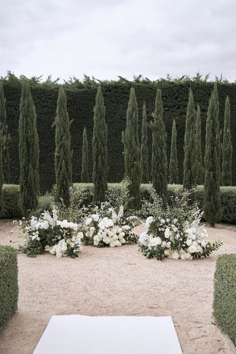 Grounded Flowers Wedding Ceremony, Ground Arbor Wedding, Ground Aisle Arrangements, Ceremony Ground Arrangements, Wedding Ceremony Florals On Ground, Ground Flower Arrangement Wedding, Wedding Ceremony Florals Ground, Ground Floral Arrangements Wedding Ceremony, White And Green Ceremony Flowers