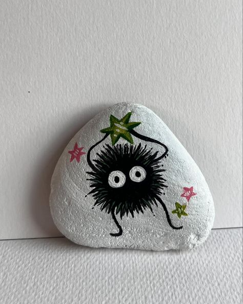 Painting Studio Ghibli characters 🥹🤗. 🤩 I am obsessed. Is this a good or a bad obsession? #studioghibli #art #artist #painting #viralart Rock Painting Ideas Studio Ghibli, Studio Ghibli Rock Painting, Paint Rock Ideas, Drawing On Rocks Ideas, Painting Ideas Studio Ghibli, Pin Painting Ideas, Painting On Rocks Ideas, Characters To Paint, Drawing On Rocks