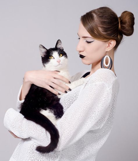 White Cat With Yellow Eyes, Hug Pose, Cat Stock Photo, Holding A Cat, Cat Stock, Black And White Cat, Photographie Portrait Inspiration, People Poses, Female Pose Reference