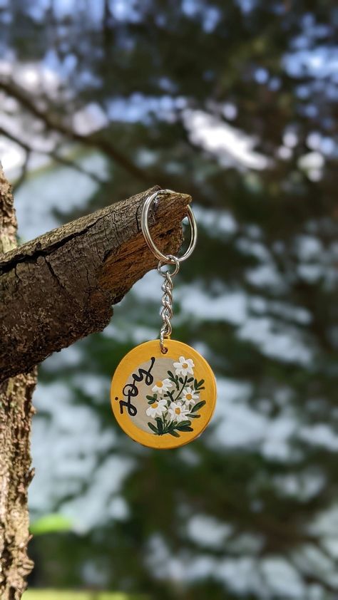 Joy/ floral WOOD KEYCHAIN Handpainted with acrylic paint on a wood and sealed with gloss varnish SIZE: 1.5 inch / ~4 cm Keychain Diy Easy, Car Hanging Accessories, Clay Keychain, Handmade Keychains, Gift For Love, Wood Keychain, Tanah Liat, Wooden Keychain, Wooden Painting