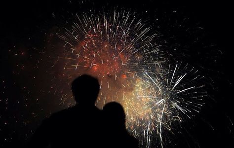 Silhouette of couple watching fireworks Couple Watching Fireworks Aesthetic, Couples Fireworks Pictures, Couples Watching Fireworks, Couple Under Fireworks, Fireworks Couple Aesthetic, Watching Fireworks Aesthetic, Couple Firework Pictures, Couple Silhouette Aesthetic, Couple Watching Fireworks