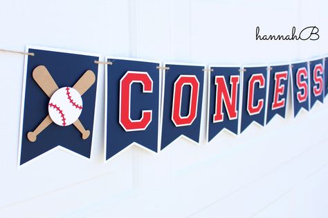 "This listing is for a custom sports \"Concessions\" banner.  This concessions banner can be customized to include any sport on the ends of the banner as well as colors.  This product is machine cut and handcrafted.   Made with premium cardstock, jute twine and pop-up dots for added dimension. Size: Each flag measures approximately 4\" x 6\". Colors: As pictured, navy, red, white.   Shipping *Items are ready to ship in 2 weeks * Items are shipped via USPS postal service * Priority mail shipping Baseball Concessions, Baseball Birthday Party Decorations, Concessions Banner, Dinosaur Cupcake Toppers, Baseball Theme Birthday, Baseball First Birthday, Baseball Banner, Bar Mitzvah Party, Baseball Decor