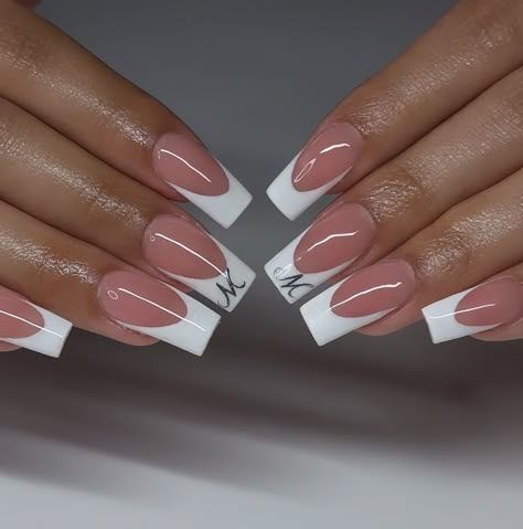 so pretty & perfect 🤍 • • • #nailzzbylo #nailsnailsnails #nails #classynails #frenchnails #nailart #naildesign #whitenails #acrylicnails #chromenails #prettynails Acrylic Nail Design With Initials, French Nail Tips Acrylics, Short Nail Designs With Initials, French Tip Initial, White Initial Nails, White French Tip Nails With Initial, French Nails With Initials, M Initial On Nail, French Tips With Initial