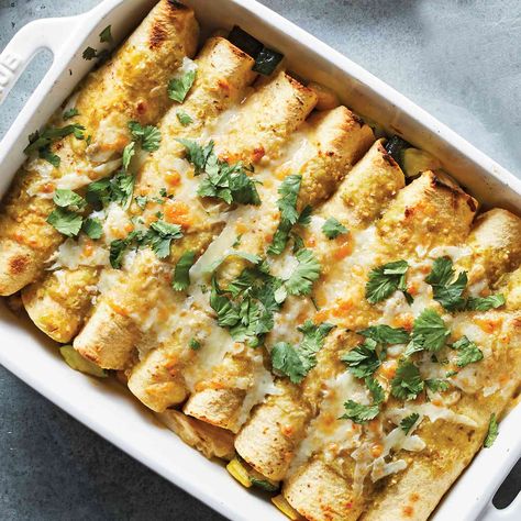 These chicken enchiladas are great for using up any veggies you have lingering in your fridge. Our chicken enchilada recipe calls for zucchini, squash and onion, but you could easily swap in spinach, onions or potatoes. 400 Calorie Dinner, Veggie Enchiladas, 400 Calorie Meals, Minute Chicken, High Protein Dinner, Cooking Mama, Protein Dinner, Chicken Enchilada Recipe, Enchilada Recipes