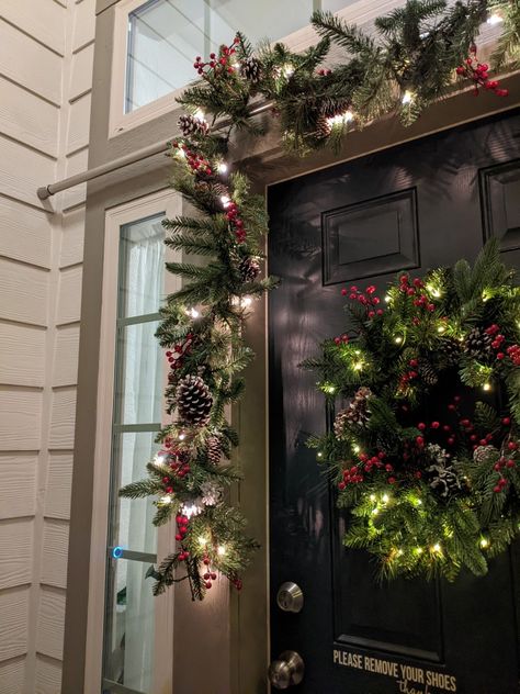 Christmas garland hung without nails on door frame Tension Rod To Hang Garland, Tension Rod Christmas Decor, Christmas Garland Doorway Front Entry, Curtain Rod Garland, Tension Rod Garland, Christmas Garland Doorway, Garland Doorway, Rod Curtains, Christmas Outdoors