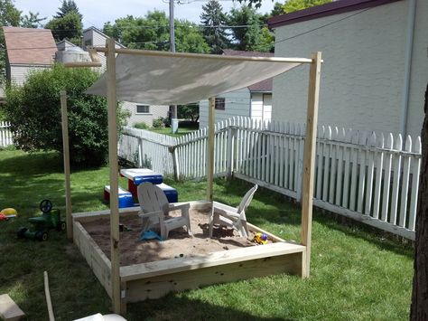 Sandbox I made with a roll away shade cover. Diy Sandbox With Canopy, Sandbox Shade Ideas, Diy Large Sandbox With Cover, Sandbox With Canopy, Kids Shed, Sandbox Plans, Sand Pits For Kids, Diy Sandbox, Diy Kids Playground