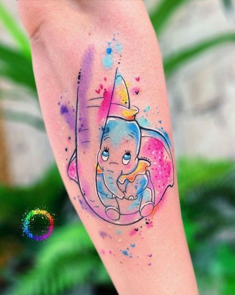 Colour Lily Tattoo, Dumbo Watercolor Tattoo, Disney Tattoo Color, Disney Color Tattoos, Disney Tattoos Watercolor, Cute Dumbo Tattoo, Dumbo And Mom Tattoo, Dumbo Tattoo Ideas, Watercolor Disney Tattoo