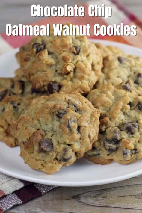 Chocolate Chip Oatmeal Walnut Cookies are delicious with a great texture. Made with semi-sweet chocolate chips, old fashions oats, and crunchy walnuts. #chocolatechipoatmealwalnutcookies #wordsofdeliciousness Chocolate Chip Cookies With Nuts And Oatmeal, Oatmeal Nut Cookies, Chocolate Chip Walnut Oatmeal Cookies, Oatmeal Chocolate Chip Walnut Cookies, Oatmeal Chocolate Chip Walnut Cookie Recipe, Oatmeal Walnut Chocolate Chip Cookies, Cookies With Walnuts Recipes, Oatmeal Raisin Walnut Cookies, Oatmeal Walnut Cookies