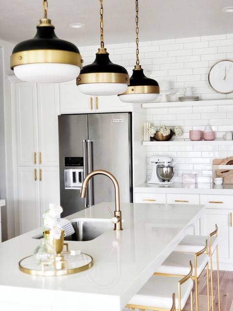 #whitelanedecor @whitelanedeco Build.com #ad Feiss Candence Pendant, brass black and white kitchen, Delta Trinsic Faucet, open shelving with subway tile, brass par pull and with white cabinets, Fuji gold barstool Fridge Wall, Rich House, Delta Trinsic, Black And White Kitchen, Metal Barn, Perfect Room, Building Homes, Kitchen Concepts, White Kitchen Design