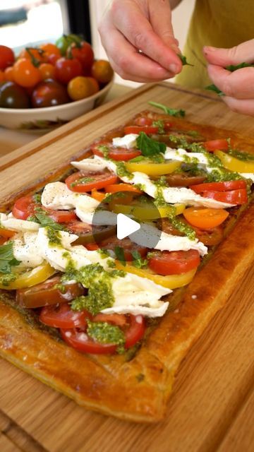 Emma Bridgewater on Instagram: "🍅 This beautiful summer tart is almost too easy to make. All you need is a sheet of puff pastry, sweet @iowtomatoes heirloom tomatoes, creamy buffalo mozzarella and fresh basil from @abelandcole  🍃 Serve this tart on @emma_bridgewater’s beautiful vegetable garden inspired plates. It’s the perfect meal to share with friends on warm, sunny days.  Caprese Tomato Tart Serves 4-6 320g sheet ready-rolled puff pastry 1 egg 500g heirloom tomatoes 3 tbsp pesto 200g mozzarella di bufala A handful of basil  Heat your oven to 200°C/Fan 180°C/Gas 6.   Unroll your sheet of pastry and leave it on top of the paper it came wrapped it. Lay it on a baking tray. Use a small, sharp knife to score a 2cm-wide border around the edge of the tart, then prick the centre of the tart Puff Pastry With Tomatoes And Mozzarella, Puff Pastry Vegetable Tart, Tomato Tart Puff Pastry, Beautiful Vegetable Garden, Summer Tart, Tomatoes And Mozzarella, Vegetable Tart, Puff Pastry Tart, Buffalo Mozzarella