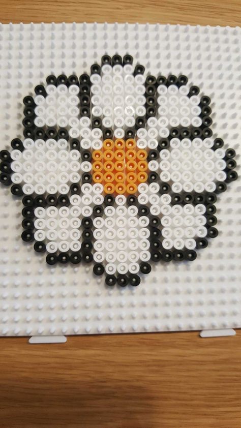 Hama bead flower. Perler Beads Ideas Flowers, Flower Melty Beads, Fused Bead Art, Flower Perler Bead Pattern, Flower Iron Beads, Daisy Perler Bead Pattern, Hama Bead Flowers, Perler Beads Flower Pattern, Peeler Bead Flower