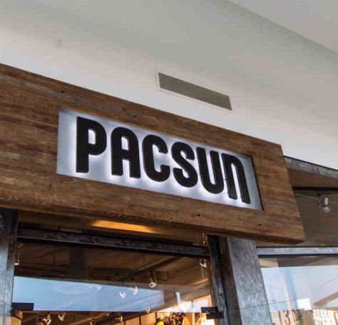 Pacific Sunwear / Pac Sun: Wooden planks as part of the storefront design with the old logo ("Pac Sun" vs. today's "PACSUN"). Early "Golden Stare of Mind" storefront with the "Pac Sun" logo in 2012. Pacsun Logo, Grace Core, Pacsun Store, Pacific Sunwear, Storefront Design, Sun Logo, Old Logo, Wooden Planks, Birthday Wishlist