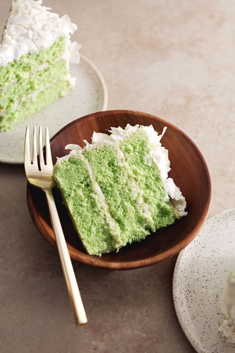 This delicious pandan coconut cake is made with soft and fluffy pandan chiffon cake layers with whipped coconut cream frosting and coconut flakes. It's full of tropical flavor and so simple to decorate! #pandancake #chiffoncake #pandancoconut #baking #layercake | teakandthyme.com Coconut Pandan Cake, Pandan Coconut Cake, Pandan Recipe, Coconut Cream Frosting, Pandan Chiffon Cake, Whipped Coconut Cream, Food Thoughts, Pandan Cake, Green Coconut