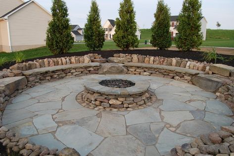 Natural Stone Outdoor Fire Pit - Traditional - Patio - New York - by E. Wyse Nurseries, Inc. | Houzz AU Rock Fire Pits, Stone Patio Ideas, Outdoor Fire Pit Seating, Terraced Backyard, Slate Rock, Backyard Area, Stone Patio, Stone Fire Pit, Backyard Seating