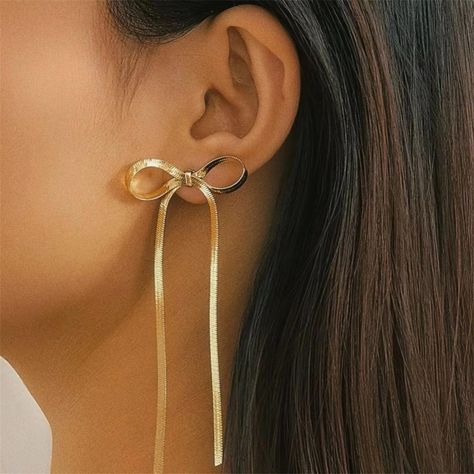 PRICES MAY VARY. Bow shaped design with a gold-finish wire makes you shine in the crowd and show your charm. These gold earrings are comfortable to wear all day long, thanks to their lightweight design, and they're easy to dress up or down. Materials: hypo-allergenic surgical grade material, perfect choice for sensitive skin. It’s durable, strong and lightweight, perfect to keep as a daily jewelry. Occasion:This is the perfect earrings for festival, parties,proms, pageants, weddings, birthdays, Elegant Gold Metal Tassel Earrings, Elegant Gold Tassel Earrings, Gold Metal Tassel Earrings For Party, Gold Tassel Earrings For Wedding, Metal Tassel Earrings For Wedding, Adjustable Yellow Gold Earrings For Party, Chic Gold Jewelry With Butterfly Knot, Butterfly Knot Drop Earrings For Party, Metal Tassel Earrings As Gift