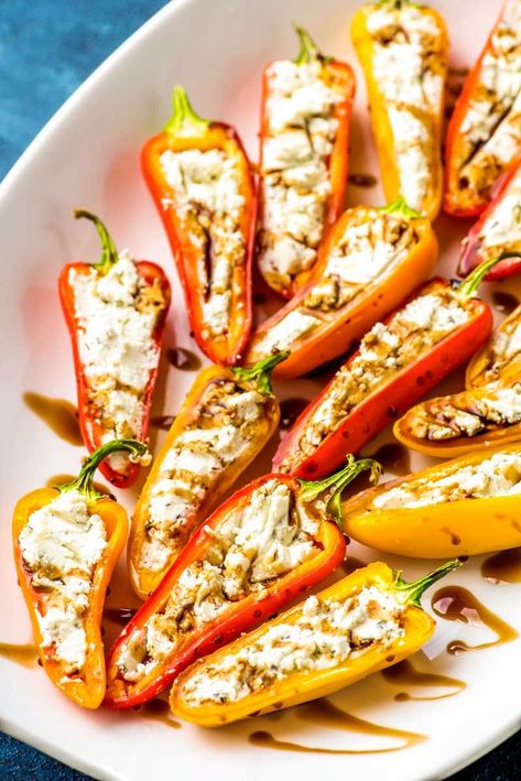 Goat Cheese Stuffed Mini Peppers! Tender sweet mini peppers filled with the pleasantly fresh (yet lightly tangy!) flavor of goat cheese and drizzled with balsamic reduction. | #ad #JoanofArcGoat @joanofarcbrie HomemadeHooplah.com Grilled Goat Cheese, Cheese Stuffed Mini Peppers, Cooking With Sesame Oil, Kid Friendly Appetizers, Chips Dip, Bacon Dishes, Mini Peppers, Goat Cheese Recipes, Cheesecake Dip