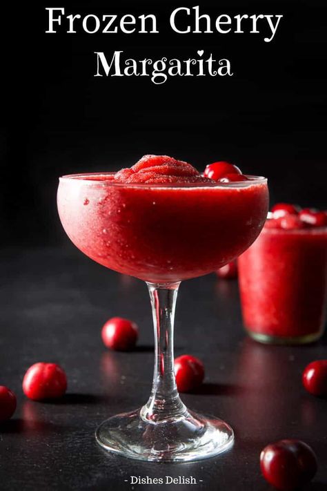 This cherry margarita is frosty, refreshing and delicious. You can make it as sweet or tart as you like but whichever way you like it, you'll be so happy you tried it or served it at your next party. #cherrymargarita #margarita #dishesdelish Watermelon Vodka Slush, Cherry Margarita, Grinch Punch, Summertime Food, Yummy Cocktails, Hey Bartender, Cherry Cocktail, Frozen Margaritas, Mixed Drinks Alcohol