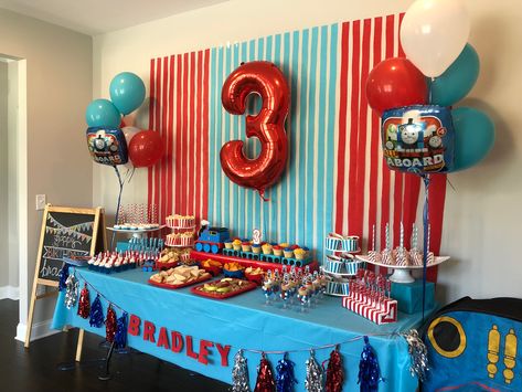 Bradley’s Thomas the Train Birthday Party Table Thomas 1st Birthday Party, 3rd Birthday Party Train Theme, Thomas And Train Birthday Party, Thomas Train Party Ideas, Thomas The Train 1st Birthday Party, Train Birthday Party Table Decor, Thomas The Engine Birthday, Thomas All Engines Go Party, Thomas Train 3rd Birthday