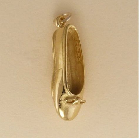 Gold Plated  Ballet Slipper Shoe Ballerina  Charm Pendant 15/16 inch, 23mm (Chain not included, for illustration only) LIFETIME REPLACEMENT GUARANTEE We will replace your item if it breaks during normal wear GOLD PLATING GUARANTEE If, in the rare event, the gold plating wears off, we will re-plate it for free The gold plating is 22 Karat over 925 sterling silver. Sterling Silver Chains ... https://www.etsy.com/listing/1340663831/sterling-silver-rope-chain-drawn-flat Gold Filled Chains ...  https Gold Slippers Outfit, Gold Slippers, Ballet Shoe, Silver Chains, Ballet Slippers, Funky Jewelry, Girly Jewelry, Slipper Shoes, Shoe Charms