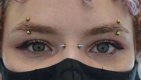 Double Vertical Eyebrow Piercing, Bridge And Eyebrow Piercing, Spiked Eyebrow Piercing, Eyebrow Piercing Both Sides, Central Eyebrow Piercing, Symmetrical Eyebrow Piercing, Eyebrow Piercing Placement, Paired Eyebrow Piercing, All Face Piercings