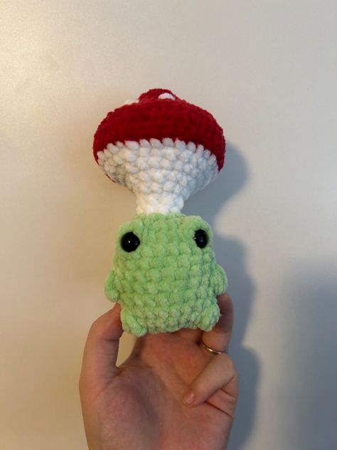 Green crochet frog with red mushroom that pops up and down. Fidget toy Amigurumi Frog, Crochet Pattern Amigurumi, Easter Rabbit, Fidget Toy, No Sew, Crochet Art, Fidget Toys, Crochet Patterns Amigurumi, Digital Pattern