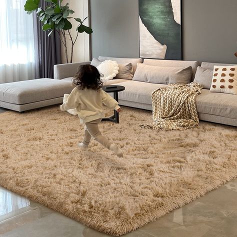 PRICES MAY VARY. Soft Fluffy Rug: The area rug is made of extra soft velvet and high-density sponge in the interlayer which gives you a soft sense to touch, and the fluffy rug has an extremely beautiful look and feel will also be the perfect addition to your family room Multipurpose Design: Featuring a plush 1.6" high pile, soft and comfortable, and the size of our soft rug about 5 x 8 feet with solid color pattern, which can easily to match your home furniture, perfect for bedroom, living room, Carpet Cute, Fluffy Area Rug, Playroom Mats, Modern Shag, Girls Home, Carpets For Kids, Rugs For Bedroom, Shag Rugs, Fluffy Rug