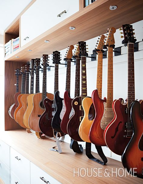 Get our best tips and tricks to beautifully displaying personal collections. | Photographer: Angus Fergusson | Designer: U31 Guitar Wall Display Ideas, Display Guitars On Wall, Guitar Collection Display, Guitar Display Ideas, Guitar Storage Cabinet, Music Studio Room Aesthetic, Basement Music Room, Guitar Display Wall, Music Room Storage