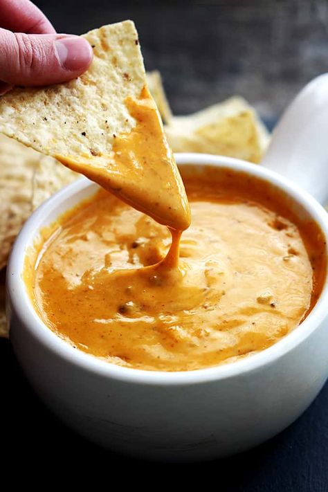 Copycat Chili's Queso that tastes so much like the original everyone will think you bought it at the restaurant! Just 5 minute prep and made in the crockpot! Chilis Skillet Queso Dip Crock Pot, Chili’s Skillet Queso Recipe Crockpot, Chilis Skillet Queso Dip Copycat, Chilis Queso, Queso Crockpot, Skillet Queso, Chili Queso, Copycat Chili, Homemade Velveeta