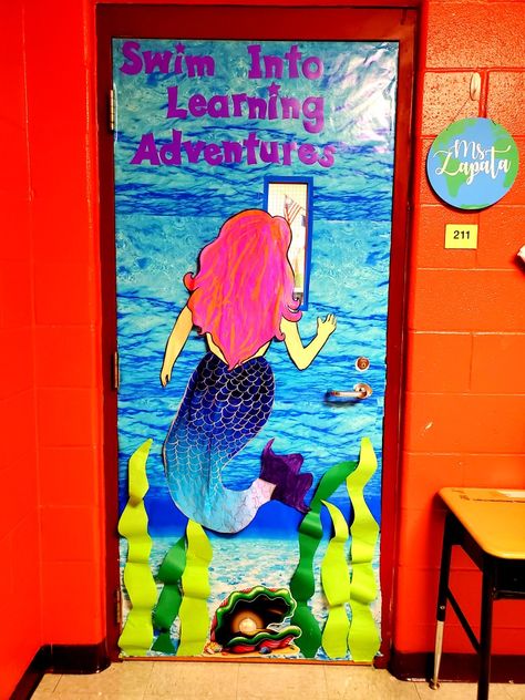 Mermaid classroom door Mermaid Classroom Door, Mermaid Door Decorations, Little Mermaid Classroom Theme, Little Mermaid Bulletin Board, Under The Sea Door Decorations Classroom, Mermaid Classroom Theme, Mermaid Classroom, Little Mermaid Decorations, Teacher Appreciation Door Decorations