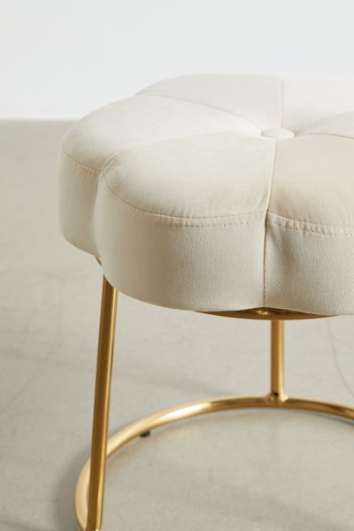 Add a luxe feel to your getting-ready space with this velvet and brass vanity stool. With a plush flower-shaped cushion set atop brass-toned metal legs. Content + Care Polyester, metal, plywood, foam Spot clean Imported Size Dimensions: 17.75”dia x 17.75”l x 17.75”h Leg height/clearance: 12.25” Seat height: 17.75” Interior seat dimensions: 17”dia Weight: 6.39 lbs Shipping package dimensions: 18.5" l x 18.13" w x 17.38" h Shipping package weight: 9.92 lbs | Ciara Flower Vanity Stool in White at U Flower Vanity, Bathroom Chair, Brass Vanity, Plush Flower, Vanity Chair, Vanity Decor, Vanity Stool, Cute Bedroom Decor, Bedroom Chair