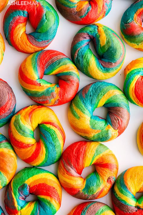 Rainbow Bagels Recipe, Flavored Bagel Recipe, Flavored Bagels, Best Bagel Recipe, Pride Recipes, Rainbow Bagel Recipe, Bagels Recipe Homemade, Bagel Flavors, Rainbow Bagel