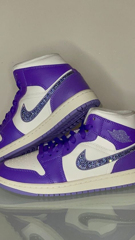 Made to order. Women's sizes. Exclusive authentic purple AirJordan 1 Mid with crystals. Each crystal is hand placed by me. High quality. I use smaller size crystals (but more quantity so it takes more work) for better and more expensive look. Sw... crystals shine like diamonds they are the best on the market. They give incredible shine in person! And I try my best to make you happy and unique with my custom sneakers. When you wear a pair you will get a lot of compliments! Because they are really amazing. Bedazzled Sneakers, Air Jordan 1 Mid Purple, Casual Shoes Women Sneakers, Custom Jordans, Pretty Shoes Sneakers, Purple Nikes, Cute Nike Shoes, Sneakers Athletic, Cute Nikes