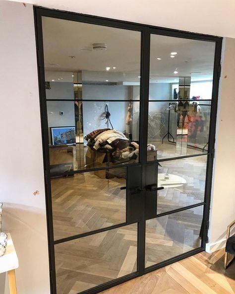 Double fire rated doors for a home gym in central London #crittalldoors #steeldoors #glassdoordesign Basement Gym Doors, Gym Door Ideas, Glass Door Gym, Glass Gym Doors, Home Gym With Glass Doors, Home Gym Glass Doors, Home Gym Doors, Home Gym Door Ideas, Gym Door Design