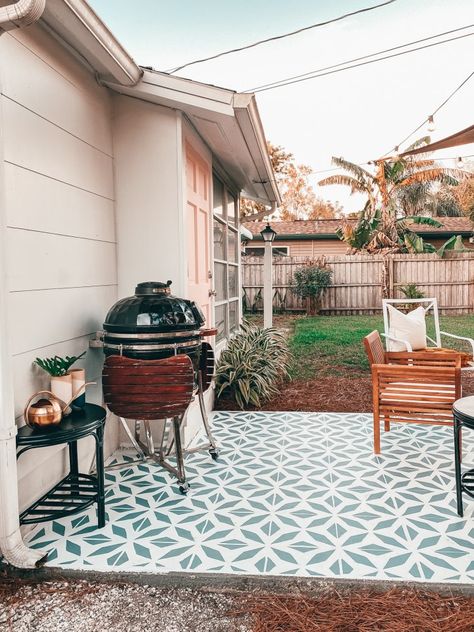 The Finished Patio (with painted pattern)   Shop the Look Painted Lattice, Blushing Bungalow, Lattice Patio, Rose Gold Candle, Types Of Mulch, Backyard Dreams, Painted Patio, Rattan Side Table, White Spray Paint