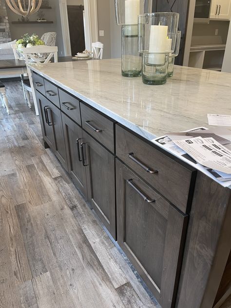 Concrete Stain Kitchen Floor, New Kitchen Dark Cabinets, Gray Floors With Brown Cabinets, Brown Cabinets Grey Floor, Dark Cabinets With Wood Floors, Dark Wood Grain Kitchen Cabinets, Dark Cabinet Light Floor Kitchen, Stained Grey Kitchen Cabinets, Kitchen Cabinet With Grey Floor