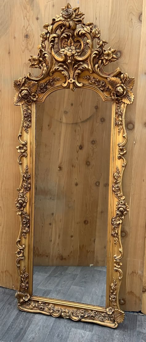 Shipping is NOT Free, please read below how to get a shipping quote.  Antique Rococo Style Ornate Carved Floor Wall Mirror  The Antique Rococo Style Ornate Carved Floor Wall Mirror is an exquisite and generously sized mirror designed in the opulent Rococo style. With a stunning gilt gold finish, this mirror boasts intricate and ornate carvings that lend it a timeless and luxurious appearance. Originally acquired in Italy, it serves as a striking and elegant addition to any home, whether displaye Antique Framed Mirror, Dream House Decor Living Room, Classic Mirror Frame, Vintage Mirror Aesthetic, Mirrored Entryway, Vintage Floor Mirror, Antique Bedroom Decor, Rococo Interior Design, Rococo Mirror