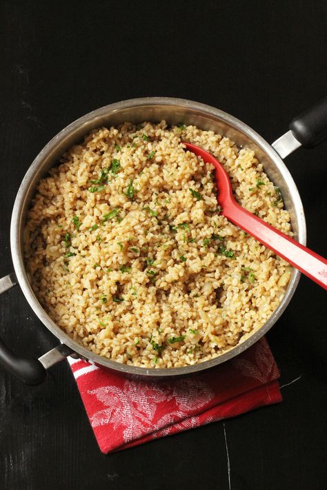 Serve up an easy side dish tonight with this Simple Brown Rice Pilaf. Based on whole grain and packed with flavor, it's a great supporting actor. Brown Rice Pilaf Recipe, Easy Rice Pilaf, Brown Rice Cooking, Brown Rice Pilaf, Veggie Bowls, Rice Pilaf Recipe, Pilaf Recipe, Delicious Sides, Pilaf Recipes