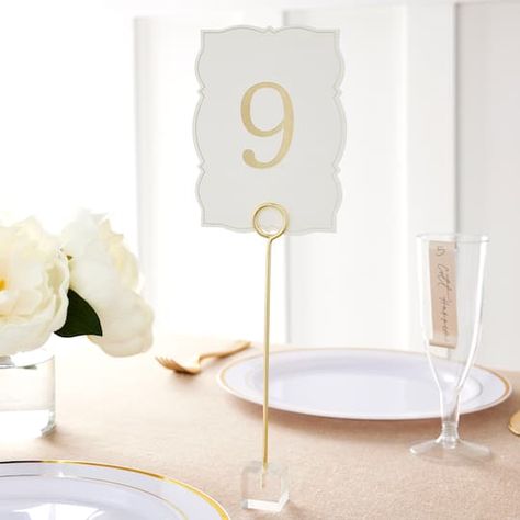 1-25 Ornate Gold Table Numbers by Celebrate It™ | Michaels Table Numbers Wedding Tall Centerpiece, Cardstock Table Numbers Wedding, Guest Table Number Ideas, Coastal Table Numbers Wedding, White And Gold Table Numbers, Tall Table Numbers Wedding, Wedding Table Number Ideas Elegant, Pearl Table Numbers, Classy Table Numbers