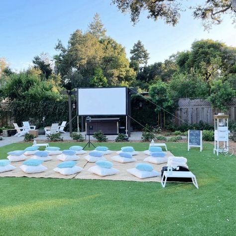 ✨🎬 **Outdoor Movie Night Birthday Bash** 🎬✨ Think cozy white and blue hues, plush pillows, jute rugs, and an endless supply of freshly popped popcorn 🍿 straight from our retro popcorn machine! 🌾✨ We’ll create the perfect ambiance for an unforgettable birthday celebration, with all the magic of a backyard cinema experience 🎥🌟. Whether it’s a kids' party or a milestone birthday, we’ve got you covered! Let us handle the details—you bring the fun! 🎈 📅 Book your next event today and make memori... How To Set Up An Outdoor Movie Night, Outdoor Projector Movie Night, Backyard Movie Birthday Party, Outdoor Movie Night Birthday Party, Kids Movie Party, Outdoor Movie Night Party, Retro Popcorn, Backyard Movie Night Party, Movie Night Birthday