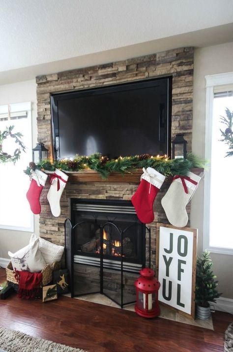 A beautiful rustic fireplace mantel for Christmas! Love the floor to ceiling brick and all of the natural decorations! Fireplace For Christmas, Rustic Christmas Mantel, Rustic Fireplace Mantels, Rustic Fireplace, Fireplace Mantel Decor, Christmas Fireplace Decor, Rustic Fireplaces, Christmas Mantel Decorations, Christmas Mantle