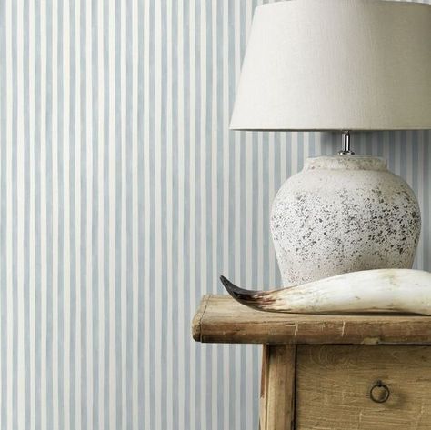 A smart and innocent watercolour stripe brings a charming touch to your walls. Please note This design is a free pattern match. Seen here in the Pastel Blue  White colourway. Neutral Bathroom Wallpaper, Striped Wallpaper Bathroom, Stripe Wallpaper Bedroom, Blue Powder Room, Serena And Lily Wallpaper, Nursery Wallpaper Boy, Blue Stripe Wallpaper, Brown Nursery, Boys Room Wallpaper