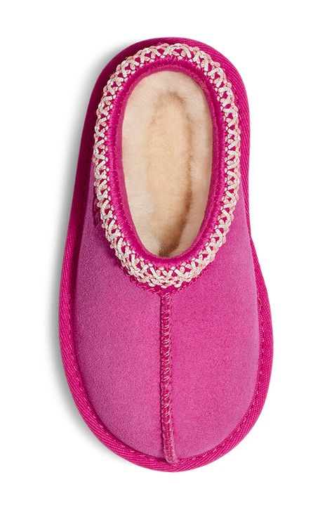 UGG's bestselling slipper is scaled down for kids and lined completely in cozy UGGplush™, a wool-blend textile designed to feel and wear like genuine shearling. Water-resistant Leather upper/UGGplush wool-blend lining/synthetic sole Imported This product was made in a factory that supports women-worker empowerment through HERproject, which creates partnerships to enable workplace-based interventions on health, financial inclusion and gender equality Ugg Slippers Ugg, Preppy Christmas Gifts For Teens, Colorful Uggs, Preppy Christmas Wishlist, Uggs For Kids, Preppy Christmas Gifts, Kids Ugg Slippers, Baby Nike Shoes, Cute Uggs