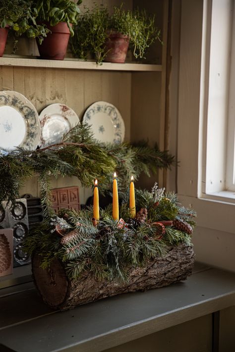 Celebrate the Winter Solstice with a Traditional Yule Log | Under A Tin Roof — Under A Tin Roof Yule Log Aesthetic, Handmade Yule Decorations, Witchy Xmas Decor, Christmas Yule Log Decoration, Herb Christmas Ornaments, Winter Solstice Crafts For Adults, Making A Yule Log, Yule Table Setting, Yule Astetic