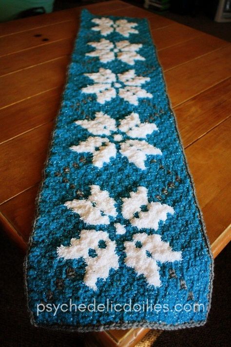 Winter c2c Table Runner Free Crochet Pattern. This fun and festive table runner can be displayed long after Christmas has been packed away. #crochetpattern #freepatterns Runner Crochet, Crochet Table Topper, Christmas Table Runner Pattern, Dog Sweater Crochet Pattern, Corner To Corner Crochet, Christmas Crochet Pattern, Crochet Table Runner Pattern, Crochet Table, Winter Table