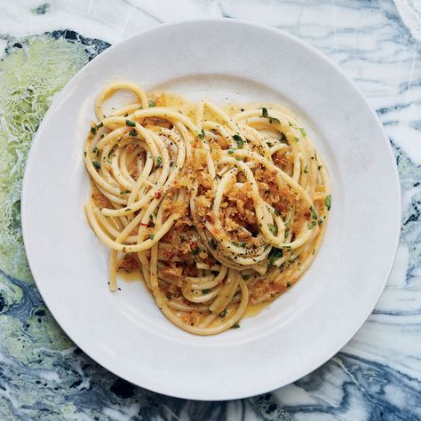 Anchovy Pasta With Garlic Breadcrumbs Recipe | Epicurious Homemade Pasta Sauce Recipe, Breadcrumbs Recipe, Feast Of Seven Fishes, Anchovy Pasta, Anchovy Recipes, Pasta With Garlic, Bon Appetit Recipes, Feast Of The Seven Fishes, Italian Seafood Recipes