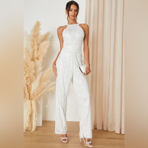 We Can't Wait To Hear All The Sweet And Lovely Compliments You'll Be Receiving In The Lulus Tell Me Everything White Beaded Sequin Wide-Leg Jumpsuit! This Stunning Jumpsuit Will Be The Center Of Everyone's Attention Due To Sheer Mesh Fabric Embellished With Shiny Sequins, Silver Beading, And Darling Floral Embroidery That Sweeps Atop A White Knit Lining And Shapes A Modified Halter Neckline And A Sleeveless Bodice. The Fitted Waist Tops Trendy, Wide Pant Legs That Fall To Ankle-Length Hems. Hidd White Halter Jumpsuit, White Jumpsuit Wedding, Tell Me Everything, Lulu Pants, Straps Jumpsuit, Trendy Bride, Tops Trendy, Bridal Jumpsuit, Wedding Jumpsuit