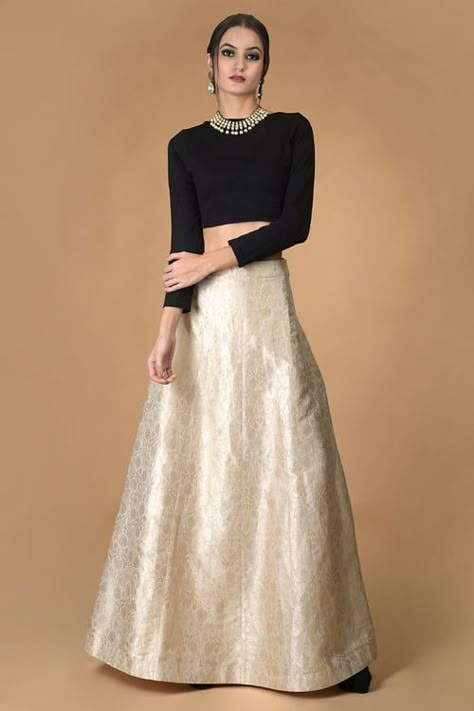 Deep Ivory Silk Brocade Panel Skirt. Timeless brocade elegance and exquisite tailored detail come together in this new collection of versatile panel skirts. Deep Ivory silk brocade skirt with panel details. The panelled skirt features 10panels, fitted waist and concealed side zip closure. The hem of skirt is 104inches wide. #blackskirt #Skirt #ladiesfashion #silkskirt Wedding Cocktail Reception, Designer Dress For Men, Panelled Skirt, Skirt Indian, Sleeveless Blouse Designs, Women Talking, Dresses For Men, Brocade Skirt, Ivory Skirt